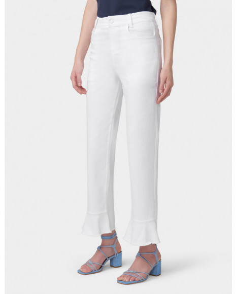 Pantalón mujer color blanco bajo con volante deshilachado, para un look casual o de noche Pantalón mujer color blanco bajo con volante deshilachado, para un look casual o de noche